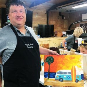 Travis with painting